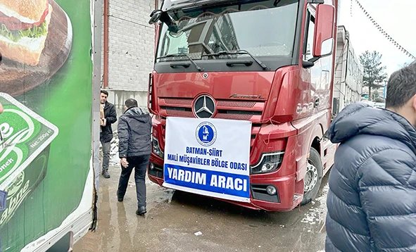 MALİ MÜŞAVİRLERDEN 2 TIR YARDIM MALZEMESİ