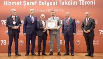 BAŞKAN DEMİR’E HİZMET VE ŞEREF BELGESİ